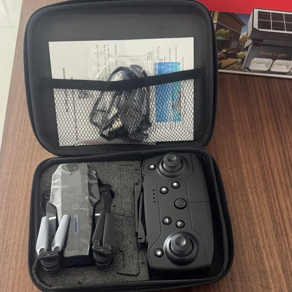 Mini wireless drone with remote control and 2 cameras can connect to smartphones